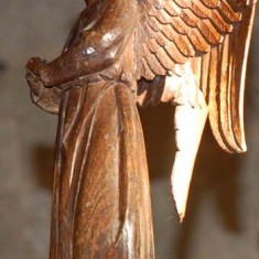 Carved angel which adorns the lectern, one of Ninian Comper's addition to the church.