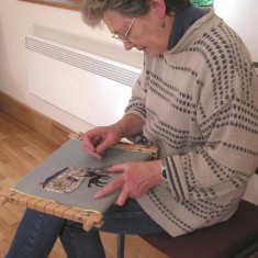 Anne Hutchings, expert embroideress.