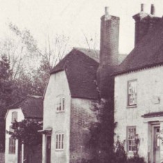 Old Bell Cottage, on the left, housed Edward A. Banhams, Saddler. It is said that villagers, who only possessed one pair of shoes, would bring these for mending. While waiting, they drank beer at an ale house at the same address 