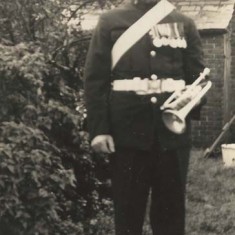 Bugler in uniform. We know that both George Fisher and his son Robert played in the fife and drum band.