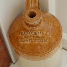 The label on this pot reads: Francis Dear, Spirit Merchant, East Meon. Francis Dear was publican at The New Inn in 1875. The pot belongs to Frank Wheeler.