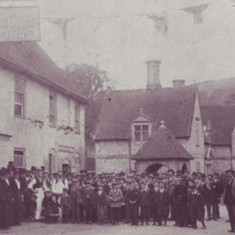 Staff and villagers outside the George Inn, celebrating Queen Victoria's Golden Jubliee, June 1887