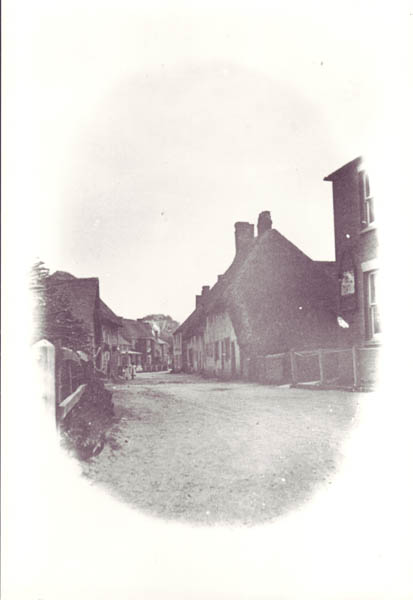 An early view of East Meon High Street. Glenthorne House can be seen in the distance, in the centre.