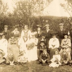 Group photo. Grandfather with John's father on knee