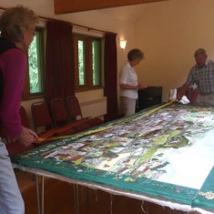 Stretching the canvas on to the oak frame.
