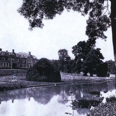 The school buildings from across the lake.