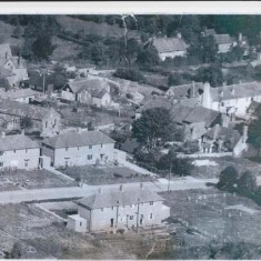 Post-war photograph of Glenthorne Meadow, with council houses partially built. Julie Pindell can be seen on the doorstep of No 18. The Institute can be seen in the top left corner,