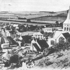 Engraving of All Saints and village from Park Hill. Cottage in churchyard and Court Farm barn. 1900s?