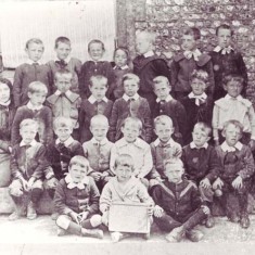 Schoolchildren with William Tregear, on the right, and assistant teachers Ada Hovell and Frida Kille.