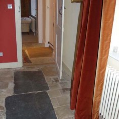 It is possible that Dom Sigebert's remains are buried under these flagstones.