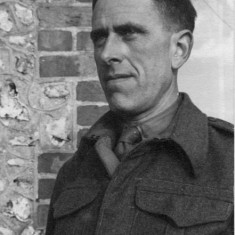 Portrait of Rev Saunders outside the Vicarage.