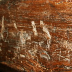  “Trinity marks” on chimney breast in the hall  – three triangulated parallel vertical lines burned into the massive oak beam; The invocation of the Trinity was believed to protect the house from evil spirits.