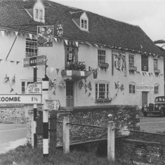 George with bunting for Coronation of Queen Elizabeth II, June 1953