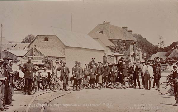 Petersfield Fire Brigade in the High Street, with Glenthorne House behind, after the great fire of 1910. From the John Baker collection.