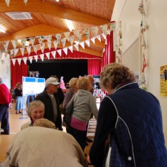 General view with visitors signing in.