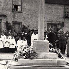 War Memorial Dedication Service The dedication of the War Memorial in 1923. The plaque above the door of Barnards, LHS, shows that A Mullard, carrier to Portsmouth, plied his trade from here at this time.