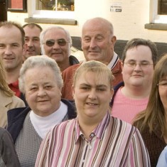 This is my Grandad Harold. (In dark glasses). Everyone calls him ‘Nobby’. He was born in 1948 and went to the ‘Old School’ on the Hill. He remembers that his headmistress Mrs Hayes kept her hanky tucked into her knicker leg. Everyone took turns to be dinner monitors, and when the milk was delivered in the  morning, it was kept warm by the stove until first break. 