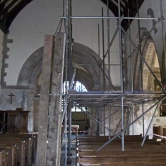Aisle with scaffolding and planks
