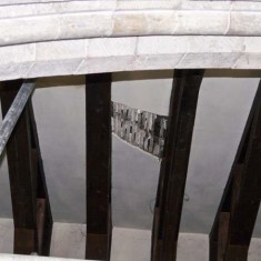 Hole in ceiling with lathes