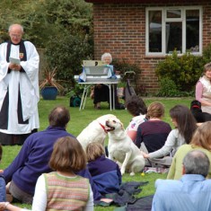 Outdoor pets' service in garden of Vicarage.