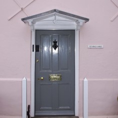 The porch of Vicarage Lodge, mentioned in its Grade II listing.