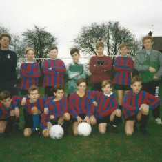 East Meon juniors football team, managed by Jeff  Wheeler.(back row, left) and Martin Cooke (right). Team, left to right, back row, WIlliam Normandale, Adrian Powney, Wayne Harfield, Jason Thorne, Joe North. Front row, Adam Dowlen, Stewart Powney. James Gough,Andrew Blackman Wayne Carter, Sam North.