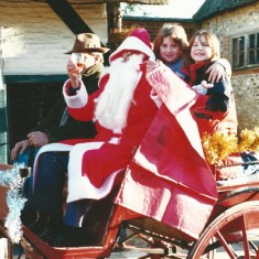 Fr Christmas, Arthur  Newbury  with glass, Malcolm Paynter driver, outside Post Office, with two girls.