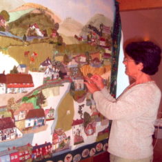 Cathy Clayson putting in the final touches Cathy Clayson lived in Heycroft on Workhouse Lane and with her husband Charles led the initiative to create the Embroidery,