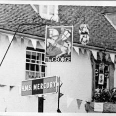 George with bunting closeup