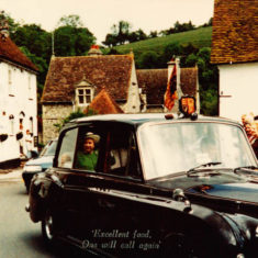 An opportunistic place mat created by Ye Olde George Inn from a photograph ofHM Queen Elizabeth II visiting the village, either for a ceremony at HMS Mercury or to call on Adrian Pelley,  retired Windsor estate manager; | Michael Blakstad