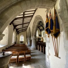 South nave & Early English arches.  Colours of HMS Mercury on wall. | Richard Gaisford