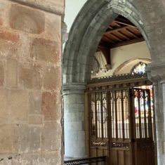 Faded medieval wall pointing of angels or saints of which only the haloes can be seen today. | Richard Gaisford